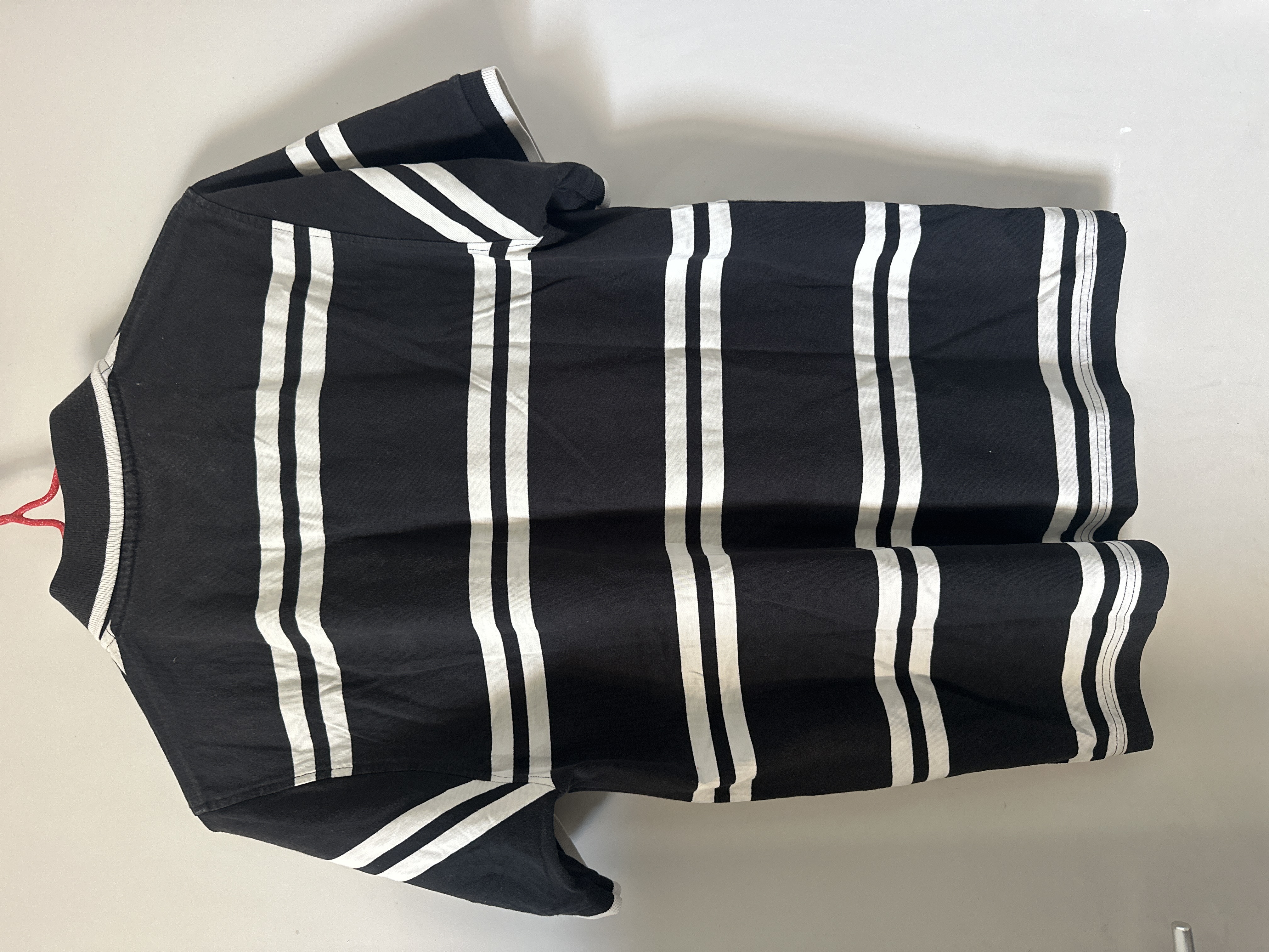 Polo Lacoste taille 3