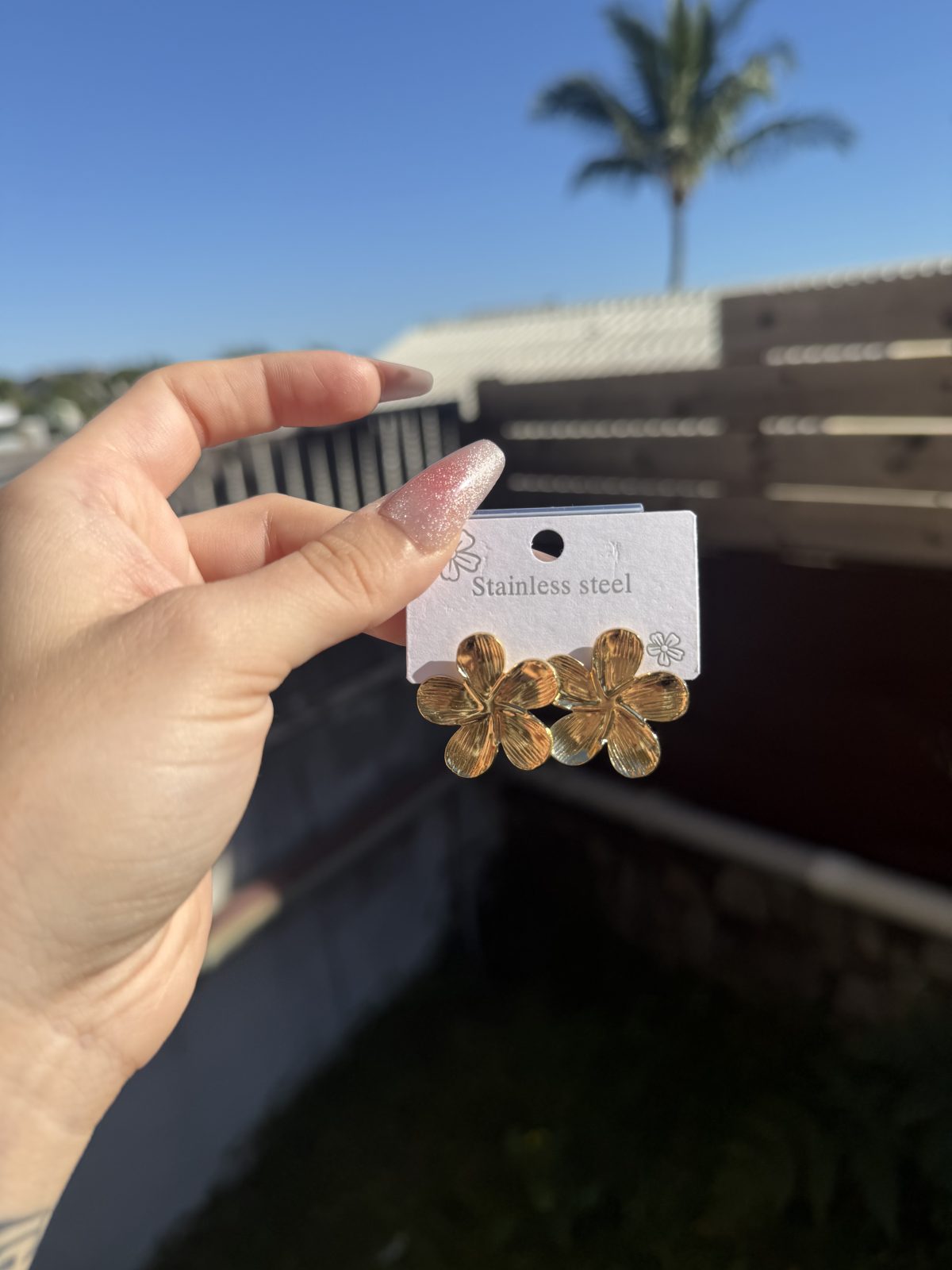 Boucle d'oreille fleur ( neuf )