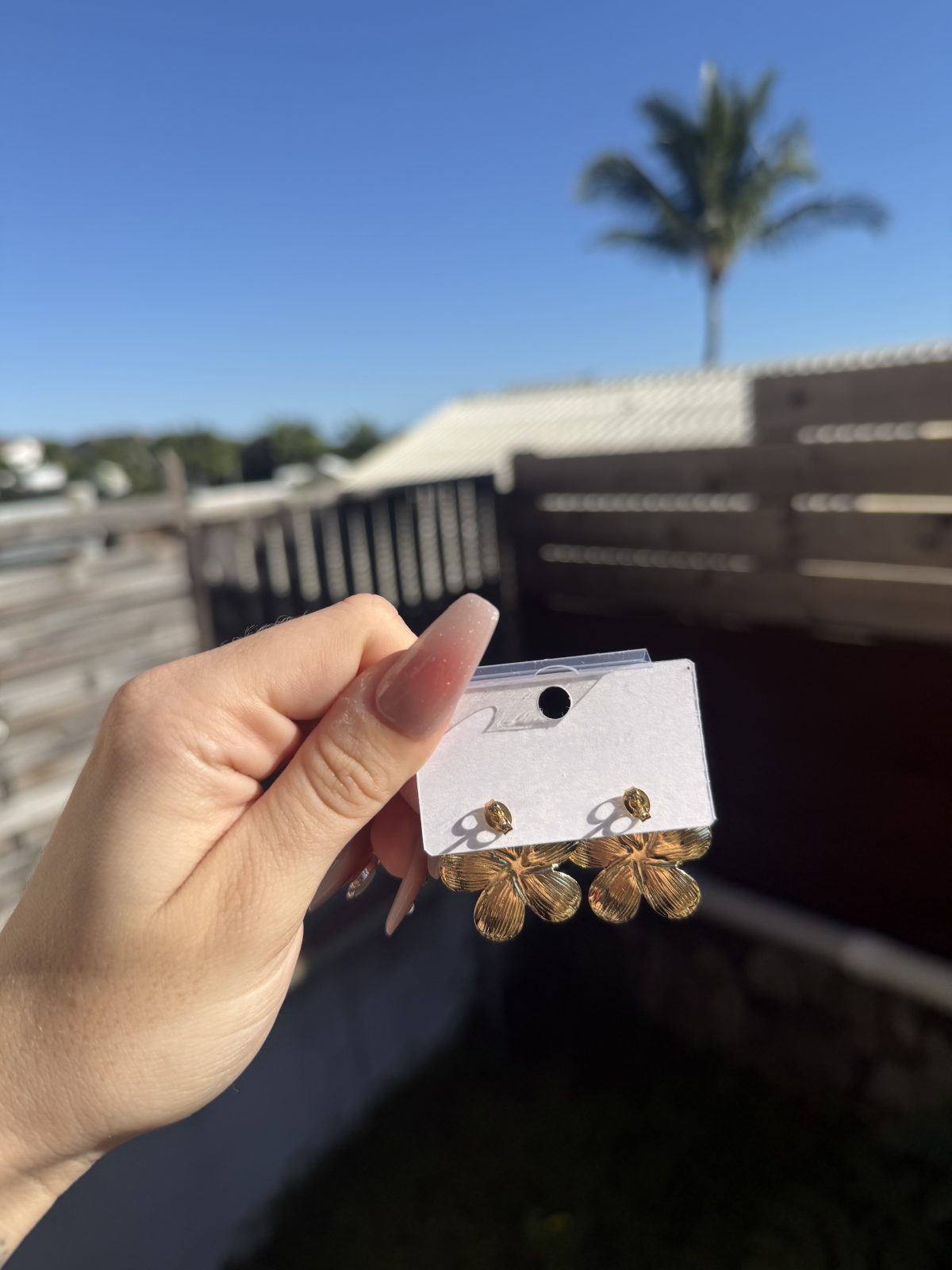 Boucle d'oreille fleur ( neuf )