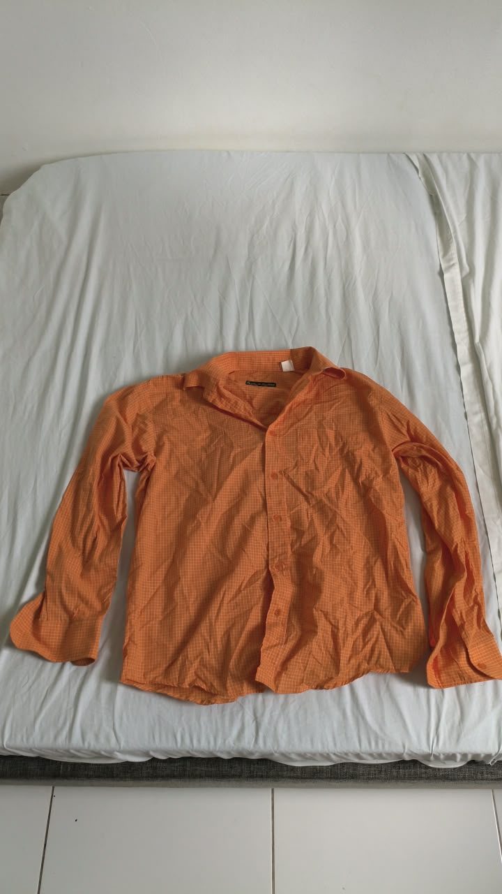Chemise orange, manches longues — L — Guadeloupe