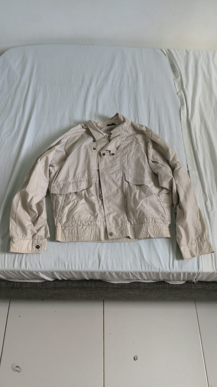 Veste beige à col montant et poches poitrine — L — Guadeloupe